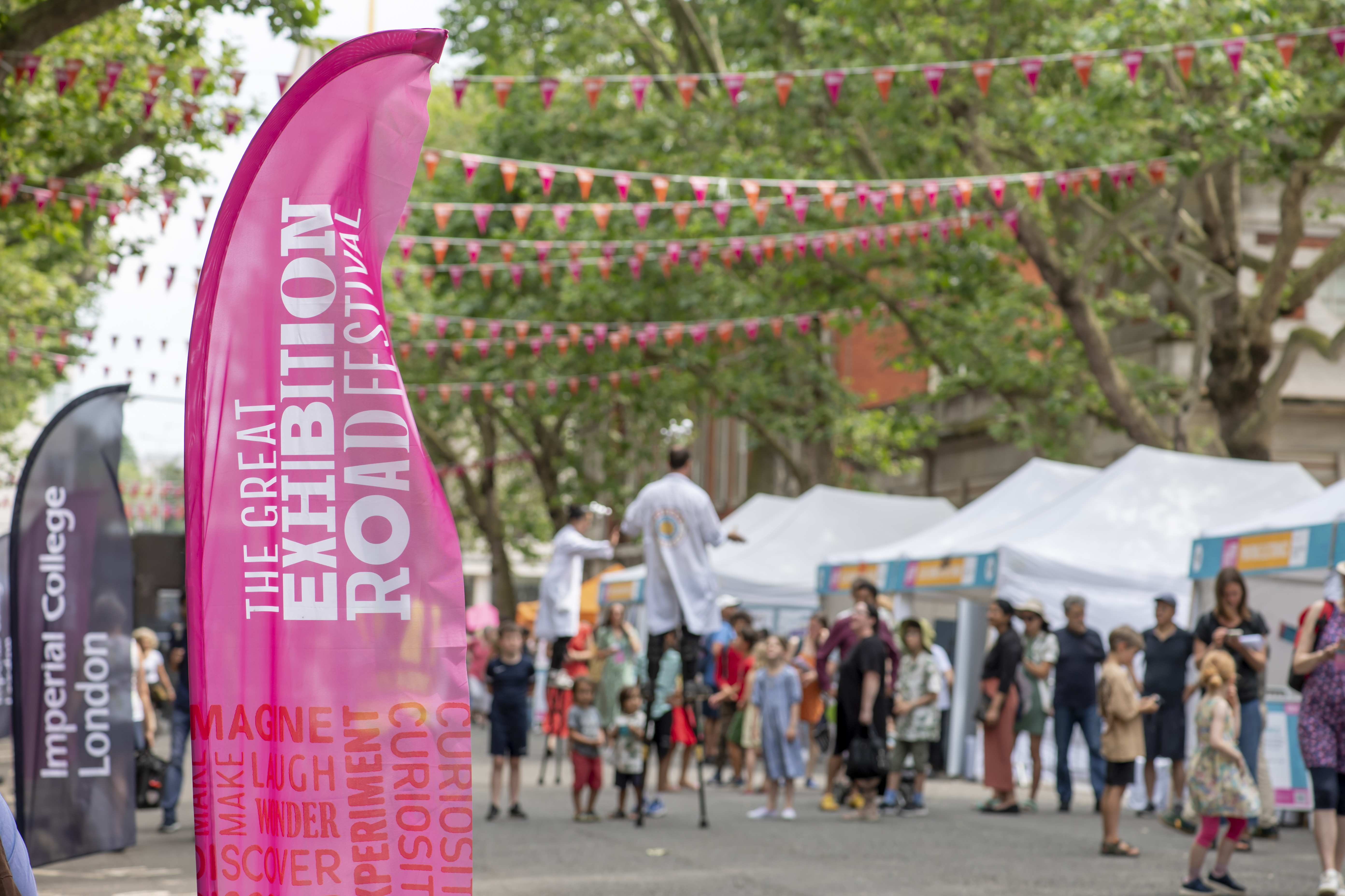 Street stalls and the Great Exhibition Road Festival pink display stand